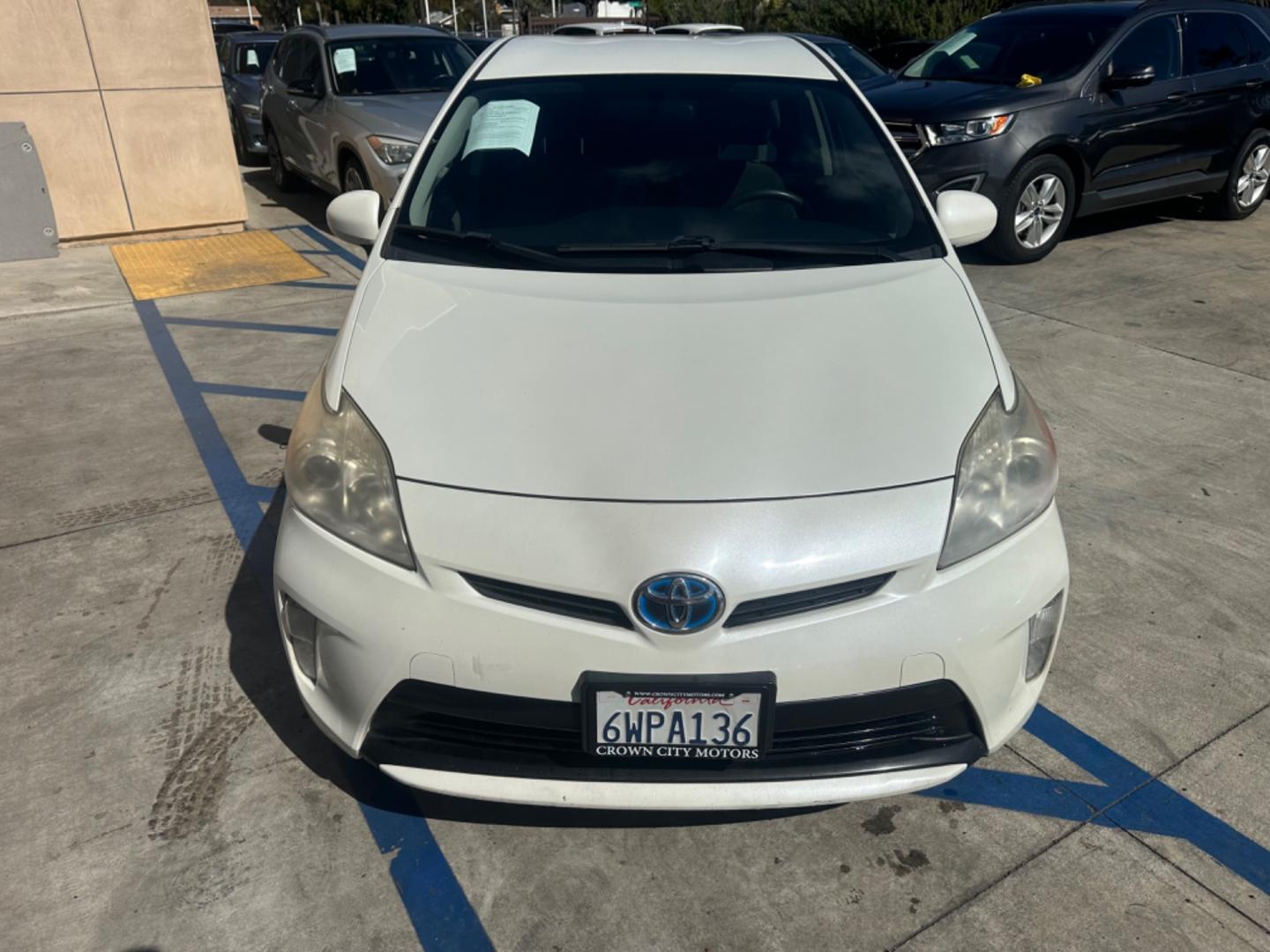 2012 WHITE Toyota Prius Cloth (JTDKN3DU3C1) with an 4 Cylinder engine, AUTOMATIC transmission, located at 30 S. Berkeley Avenue, Pasadena, CA, 91107, (626) 248-7567, 34.145447, -118.109398 - Crown City Motors is a used “Buy Here Pay Here” car dealer in Pasadena CA. “Buy Here Pay Here” financing, means that when you purchase your vehicle from our dealership, that you make the payments to the dealership as well. We do not need the banks approval to get you approved for a used auto - Photo#7